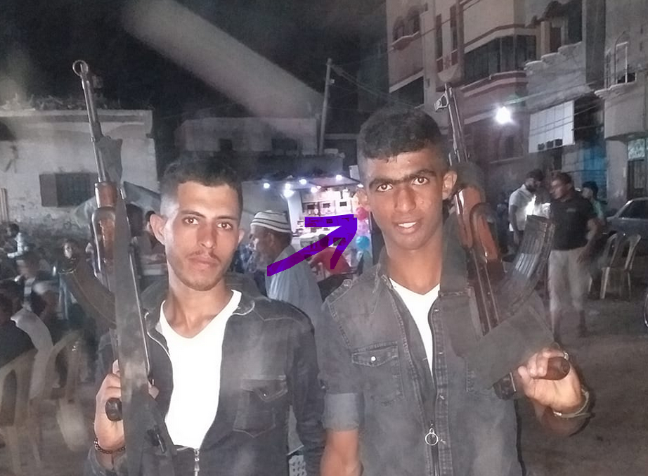Osama Abu Nasser with a gun